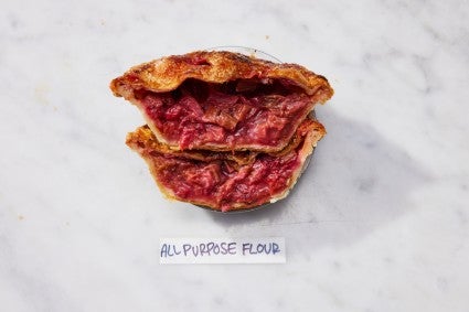 Mini strawberry-rhubarb pie sliced in half